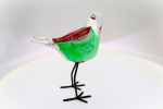 Glasvogel auf Metallfüssen